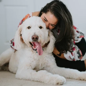 Women Playing with Dog